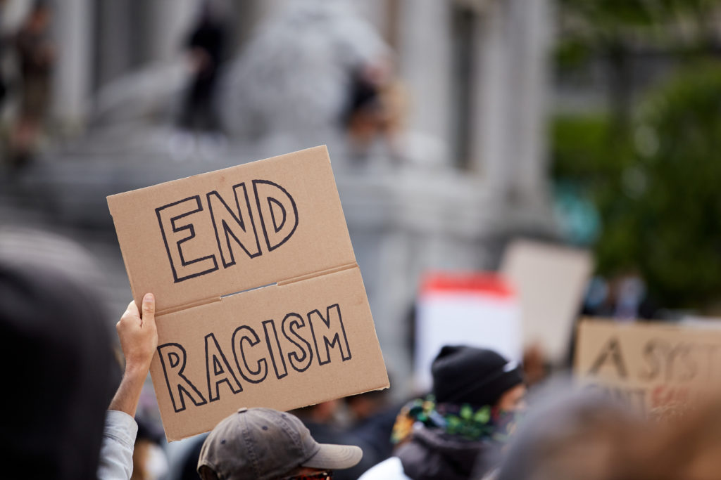 End Racism protest sign