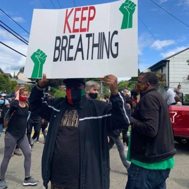 Keep Breathing protest sign - Community Support